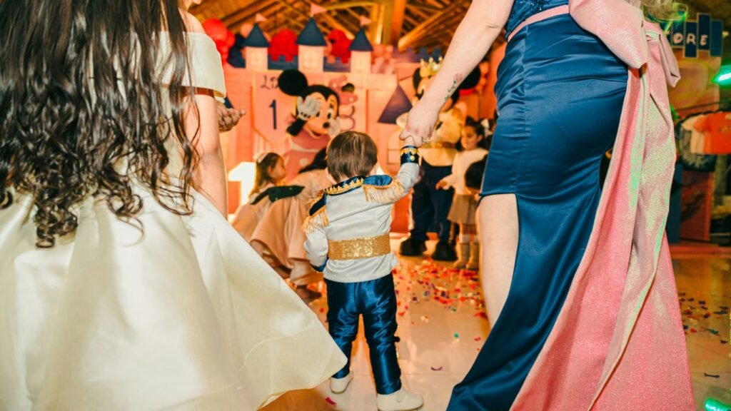 Children in costumes at a disney-themed party